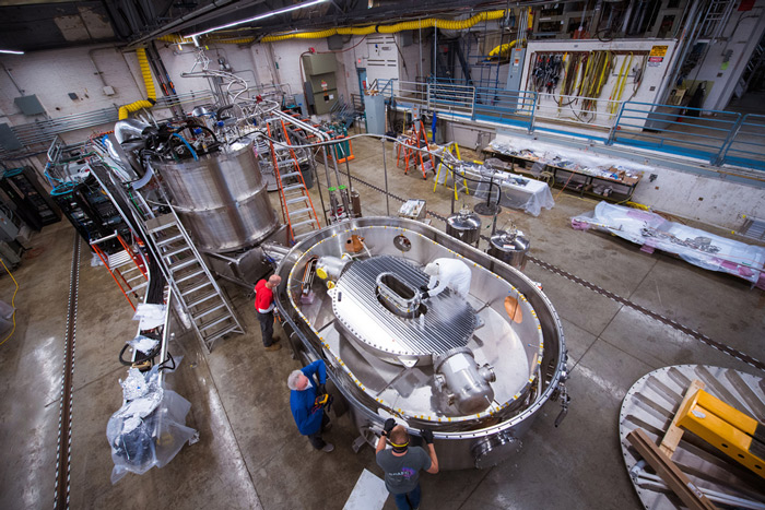 A team works on the magnet housed at the Plasma Science and Fusion Center at MIT. (Photo courtesy MIT)