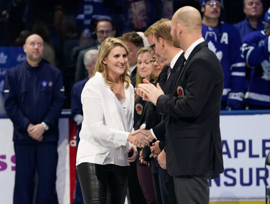 Nov 15, 2019; Toronto, Ontario, CAN; Class of 2019 Hockey Hall of Fame inductee Hayley Wickenheiser shakes hands with hall of famers prior to a game between the Boston Bruins and Toronto Maple Leafs at Scotiabank Arena. Mandatory Credit: John E. Sokolowski-USA TODAY Sports