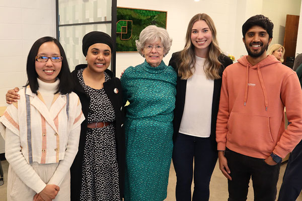 Graduate students taking courses offered through the centre join Jane Graham at the grand opening on April 21. From left to right: Marie Rogel, Harjot Kaur, Jane Graham, Amy Miller and Sai Kumar). (Photo: Submitted)