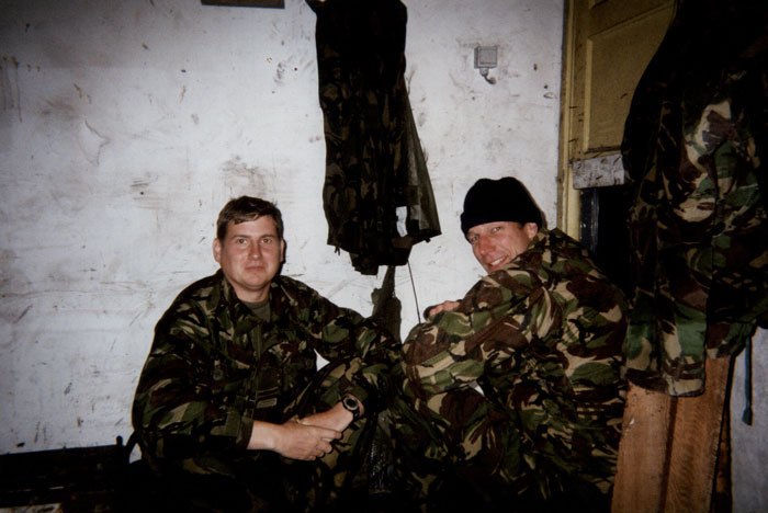 (Pictured on left)  ‘On the run; hiding out till nightfall’.  In the middle of Escape and Evasion training with the British Army while serving on exchange in the UK 2000-2003. (Photo: provided)