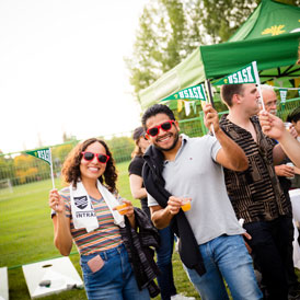 Alumni at USask Alumni booth in Rally Alley