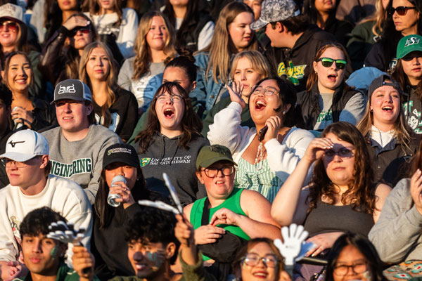 Fans cheering Huskies at Homecoming 2025